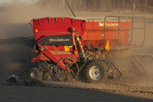 Drill Prints: Tume Nova Combi 4000 seed drill, sowing seed in field, Sweden, may
