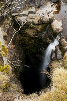 Cave Prints: Upland stream flowing into chasm