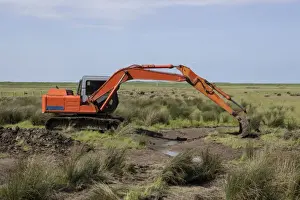 Machinery Prints: Using a digger excavator for habitat restoration work on Deepdale Marsh
