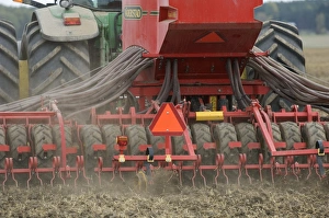 Drill Prints: Vaderstad seed drill, drilling wheat crop, Sweden, autumn