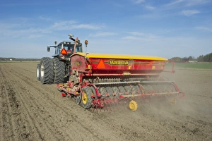 Cultivate Prints: Valtra tractor with Vaderstad Rapid 400C seed drill, drilling arable field, Sweden, may