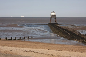 Iron Prints: Victorian cast iron lighthouse on beach, Dovercourt, Harwich, Essex, England, July