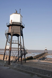 Iron Prints: Victorian cast iron lighthouses on beach, Dovercourt, Harwich, Essex, England, July