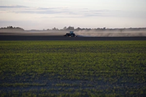 Roller Prints: View across arable field, tractor with rollers
