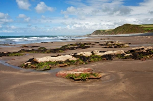 View of beach at low tide, looking towards Saunton and Baggy Point, Peppercombe, North Devon, England, august