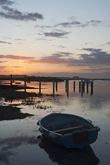 Silhouettes Prints: View of boats in coastal creek at high tide