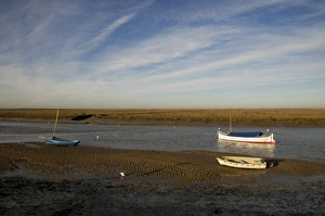 Creeks Prints: View of boats moored in coastal creek at low tide