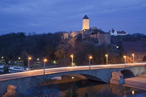 Castles Prints: View of bridge and castle illuminated at night