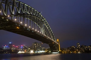 Bridges Prints: View of bridge and city skyline at night