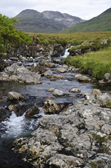 Burn Prints: View of burn flowing from mountain towards sea loch