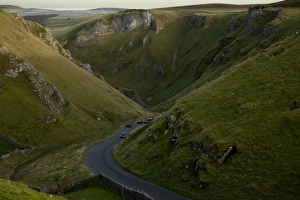 Cars Prints: View of cars on road through moorland with limestone pinnacles
