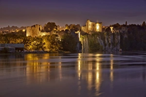 Historic Prints: View of castle on cliff overlooking river at twilight