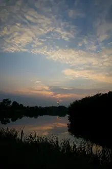 Sun Set Prints: View of cirrocumulus clouds over flooded former gravel pit habitat at sunset