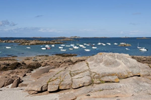Moored Prints: View of coast with boats moored at sea