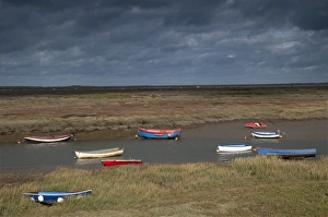 Saltmarsh Prints: View of coastal saltmarsh and boats moored in creek