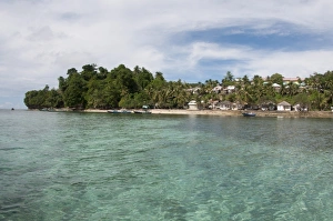 Maluku Prints: View of coastal settlement on tropical island