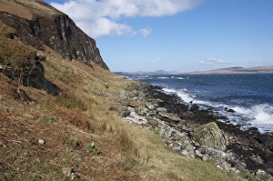 View of coastline, looking towards Jura, near McArthurs Head, Islay Sound, Islay, Inner Hebrides, Scotland, March
