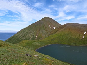 View of coastline and mountains, Kittiwake Lake, Alaska Maritime National Wildlife Refuge, Buldir Island