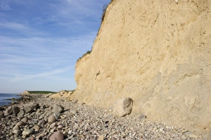Erosion Prints: View of coastline with pebble beach and sea cliff