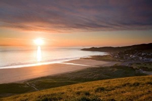 Shore Prints: View of coastline and seaside resort at sunset
