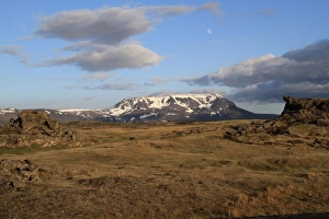 Northern Europe Prints: View of distant mountain in evening sunlight