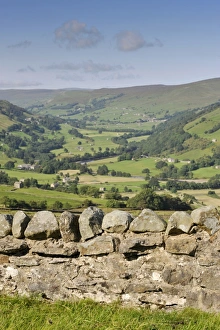 Swaledale Prints: View over drystone wall across river valley with farmland