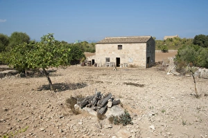 Country Side Prints: View of farm buildings in dry farmland