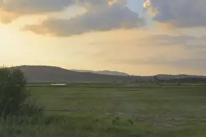Central Europe Prints: View of farmland on temporarily dry intermittent lake at sunset
