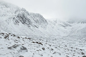 Glacial Prints: View of glacial corrie valley landform covered in snow