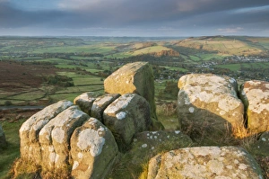 Dark Peak Prints: View of gritstone rocks on moorland at sunrise
