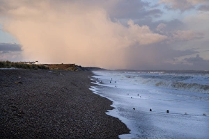Cottages Prints: View of incoming tide over shingle beach