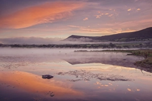 Sunrise Prints: View of lake in mist at sunrise