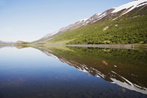 Subpolar Prints: View of lake with reflection of mountains, Ljosavatn Lake, Iceland, June