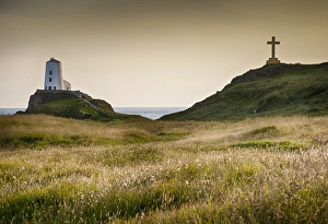 National Prints: View of lighthouse, cross and coastline on tidal island