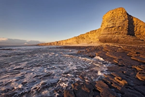 Limestone Prints: View of limestone cliffs in evening sunlight