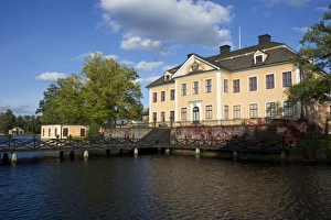 Mansion Prints: View of manor house beside water