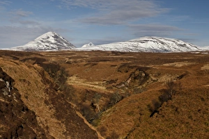 Peak Prints: View of moorland habitat and snow covered mountain peaks, viewed across Abhainn Mhor