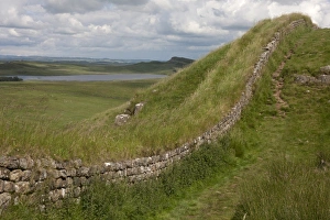 View of moorland and lake with remains of Roman fortifications, Hadrians Wall