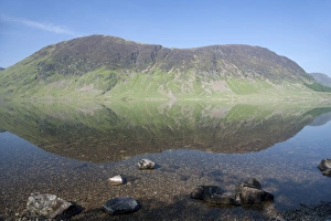 View of mountains reflected in lake, Mellbreak, Crummock Water, Lake District N. P. Cumbria, England, June