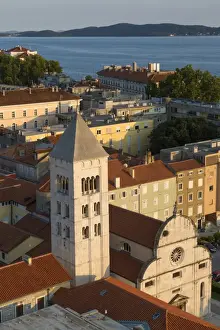 Religions Prints: View of old town and Catholic church with Romanesque campanile