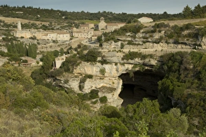 Cave Prints: View of old village on gorge with large cave