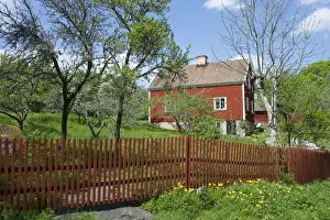 Cottages Prints: View of red house in rural setting, Uppland, Sweden, may