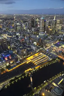 Victoria Prints: View of river and city skyline at night