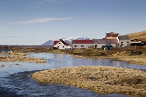 Iceland Prints: View of river and farm buildings, River Laxa, Myvatn, Iceland, May