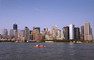 Eastern Seaboard Prints: View of river with U. S. Coast Guard boats and city skyline