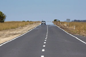 Cars Prints: View of road with mirage in heat, South Australia, Australia, February
