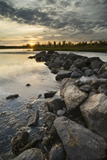 Northern Europe Prints: View of rocks and lake at sunset, Muonio, Lapland, Finland, September
