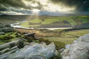 View over rocks towards reservoir, looking from Derwent Edge towards Ladybower Reservoir, Peak District N. P
