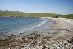 Sandy Prints: View of rocks on sandy beach, Lunda Wick Bay, Unst, Shetland Islands, Scotland, June
