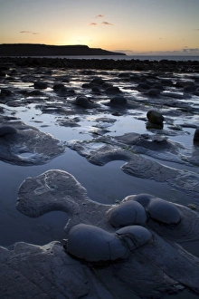 Shore Lines Prints: View of rocky beach at sunset, Runswick Bay, North Yorkshire, England, may